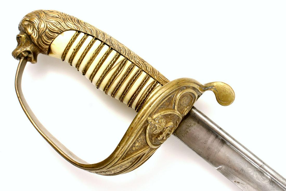 Imperial German WW I era Navy Officer's Lion Head Sword with Etched Blade & Gilt Mounts ~ Fine Grip.: Imperial German WW I era Navy Officer's Lion Head Sword with Etched Blade & Gilt Mounts ~ Fine Grip. Total length (inside scabbard if present) : 36", Blade length : 30 3/4 ". ~~ DEAR BIDDERS, Please V