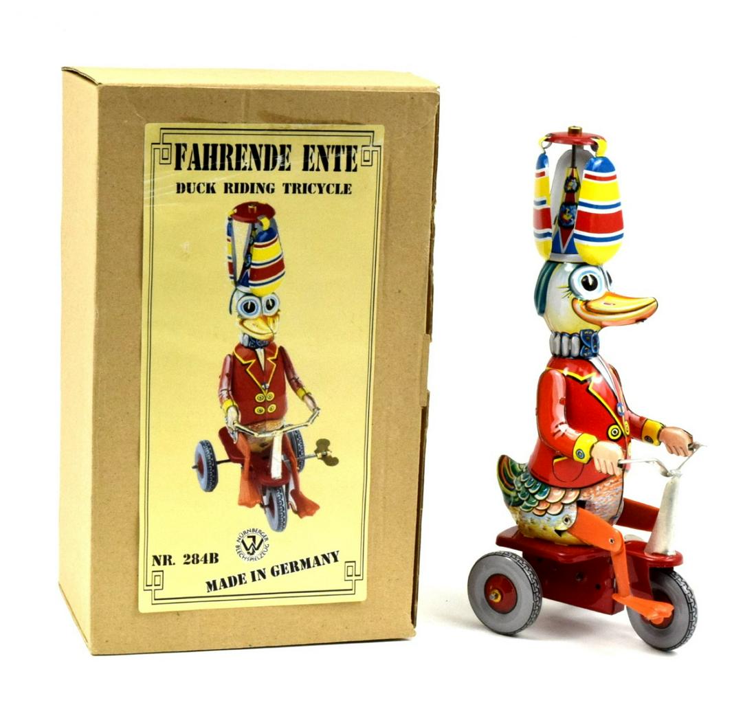 GERMAN CLOWN DUCK ON TRICYCLE BIKE Wind-Up Tin Toy c.1960: Fully Ggenuine original boxed and unused tin toy Duck on Tricycle Bike! Its a great looking, very realistic looking and fantastically well lithographed model! It's the original one in the grey box! No