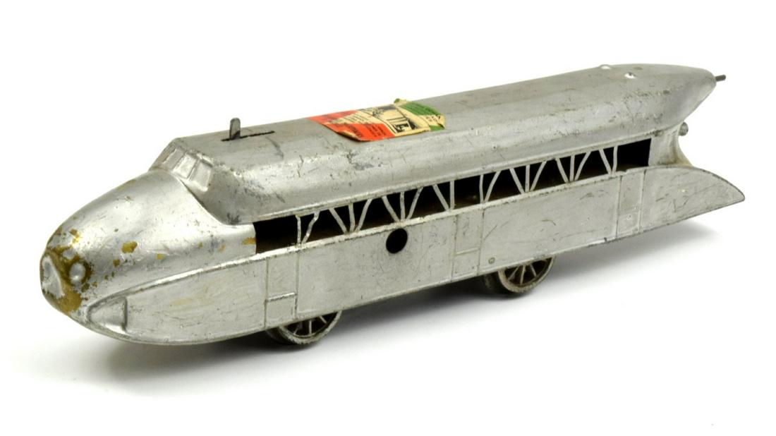 Vintage Deco Wind Up Pressed Steel Train Mexico Market: Unusual Art Deco style pressed steel wind up toy train for Mexico market. Unmarked. Size: 11 3/4" x 2 1/2".