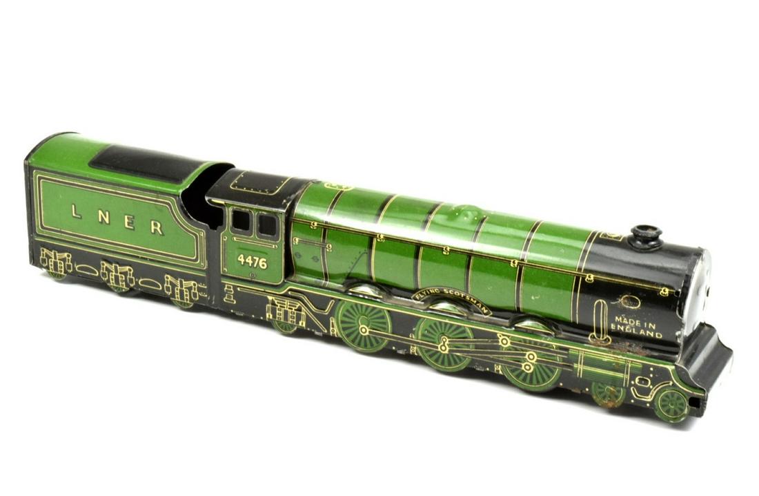ENGLAND Wind Up 1923 LNER 4476 Flying Scotsman Train: Rare ENGLAND LNER # 4476 "Flying Scotsman" tin litho wind up train c.1920's. no damage. 14 1/4" x 3 1/8". Came from long time toy collector estate.DEAR BIDDERS, Please View More Detailed Close-Up Imag