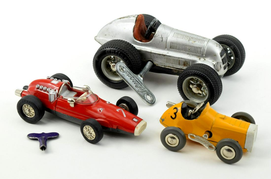Lot Of 3 Vintage Schuco Germany Race Cars: Very fine lot of 3 vintage Schuco Germany race cars. Red Micro Racer Ferrari 1040/1 - 5" Yellow Micro Racer 1041 - 3.5" Schuco Studio 1050 - 5.5". come with keys.~~ DEAR BIDDERS, Please View More Deta