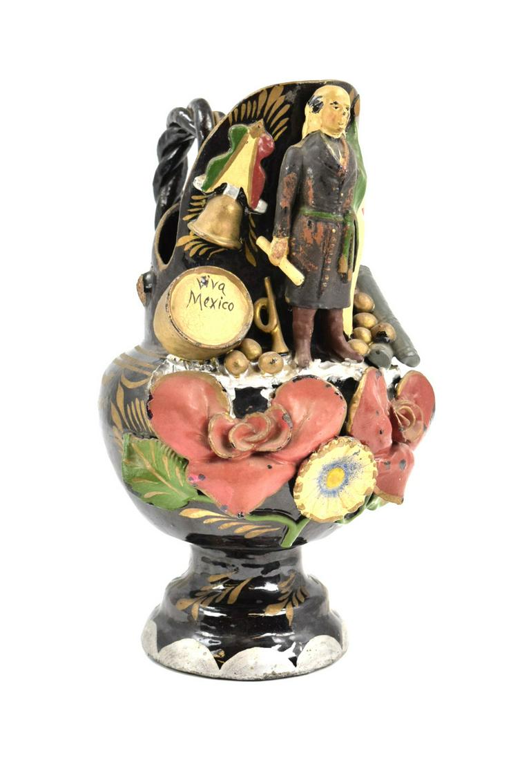 Very rare antique hand painted Mexican military design: Very rare antique hand painted Mexican military design "Viva Mexico" folk art Pulque figural pitcher. Pitcher depicting Mexico official with flag, drum and two canons. Good original condition. Very ha