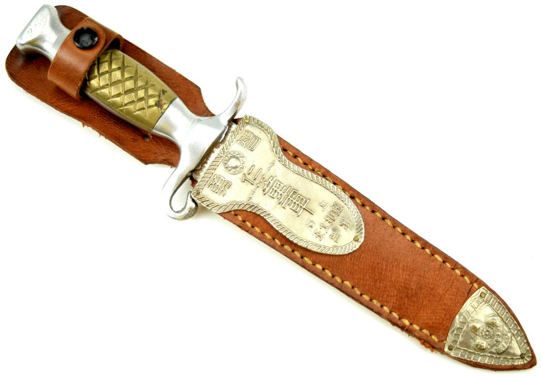 Chinese Boy Scout Knife in Scabbard: Chinese Boy Scout Knife in Scabbard bearing motto on the scabbard. Total length inside scabbard : 10 1/4", Blade length : 5". ~~~. Detailed condition reports are not included in this catalog. For addi