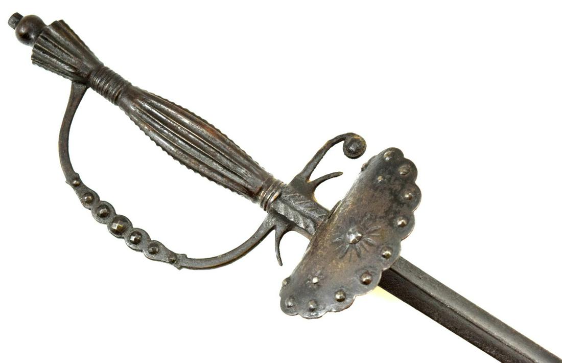 ENGLISH OFFICERS DRESS SWORD RAPIER, 19TH C.: English officers dress sword rapier, 19th c.. In cut steel mounts with a strong triangular section blade. Total length (inside scabbard if present) : 36 1/2", Blade length : 29". ~~ DEAR BIDDERS, Plea