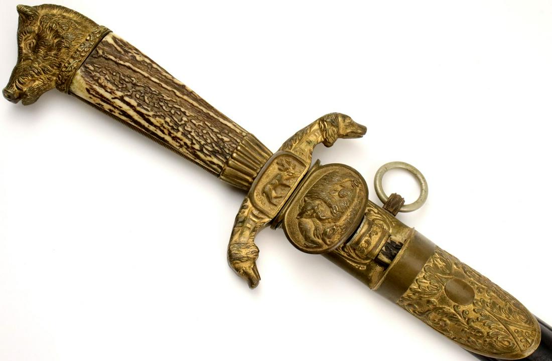 Fine Large 19th C. German Aristocrat's Hunting Sword & Skinning Knife, Elaborate Gilt Mounts with: Fine Large 19th C. German Aristocrat's Hunting Sword & Skinning Knife, Elaborate Gilt Mounts with Impressive Large Boar Head Pommel. Total length (inside scabbard if present) : 29 3/4", Blade length :