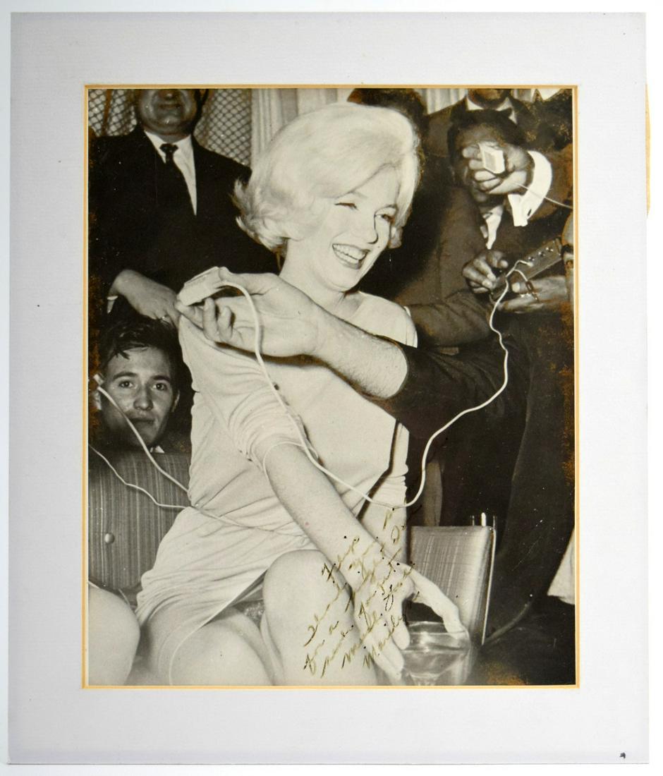 Rare Unpublished Signed Marilyn Monroe Erotic Photograph: Rare unusual erotic unpublished Marilyn Monroe signed photograph presented to ( looks like but not sure, hard to read ) "Felipe, Thank you so much for a night. I'll never forget, love Marilyn". Came f