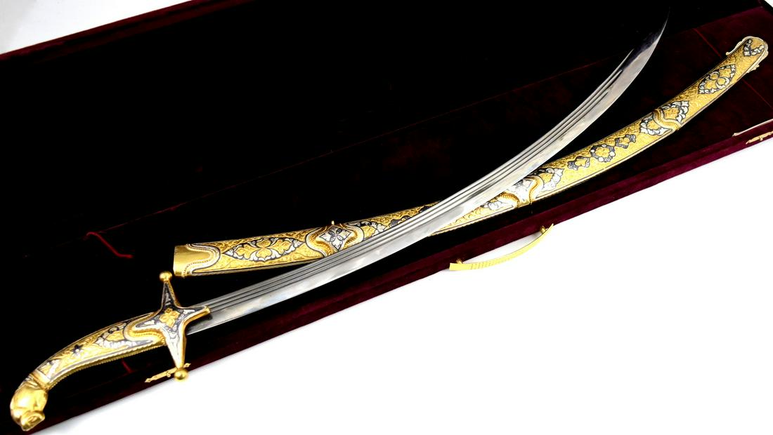 ORNATE RUSSIAN SOVIET ERA CAUCASIAN DAGESTAN PRESENTATION SHAMSHIR SWORD IN NEILLO: Russian soviet era Caucasian Dagestan presentation shamshir sword in Niello silver & gilt. Specially made Case. Total length (inside scabbard if present) : 35", Blade length : 27". ~~ DEAR BIDDERS, Pl