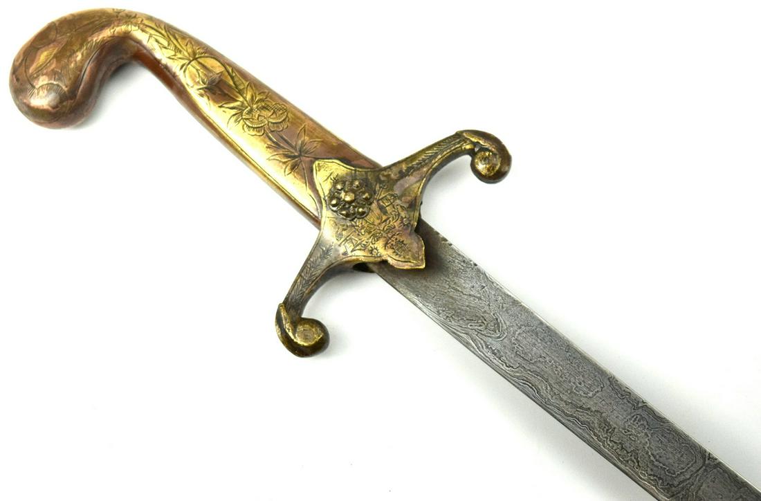 19th Century Turkish Shamshir Sword with Nice Damascus Blade: 19th Century Turkish Shamshir Sword with Nice Damascus Blade. Nice decorated guard ( seems to be some cooper mix). Total length (inside scabbard if present) : 27 1/4", Blade length :22 ". ~~ DEAR BIDD