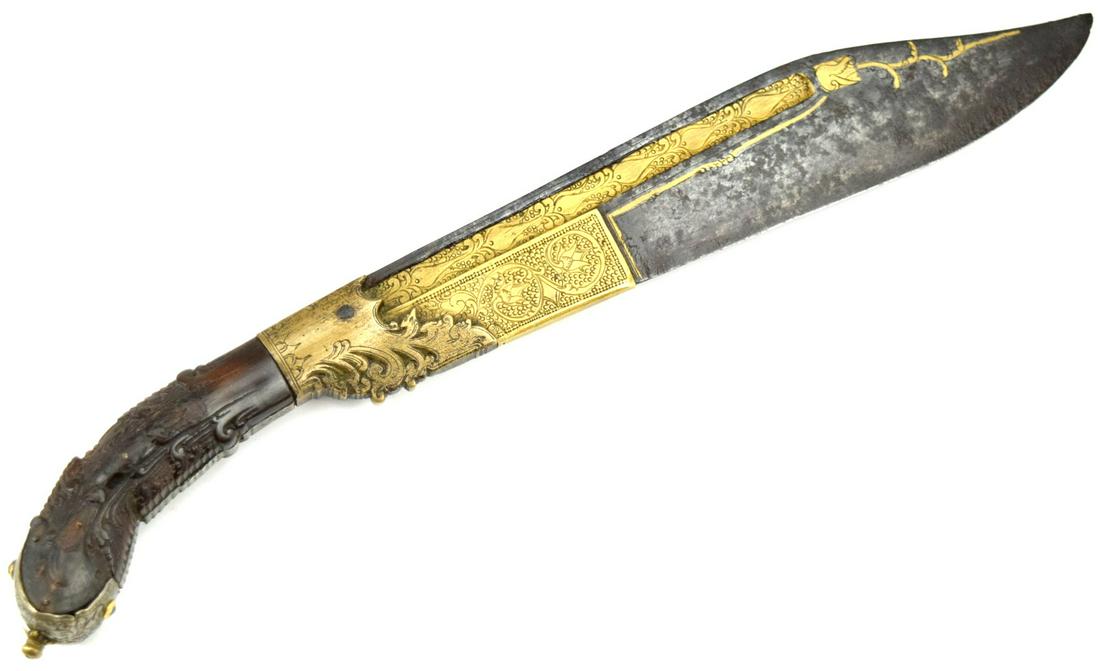 Excellent 18th-19th C. Sinhalese Ceylon Pina Kaetta Dagger with Massive Highly Decorated Blade: Excellent 18th-19th C. Sinhalese Ceylon Pina Kaetta Dagger with Massive copper highly decorated Blade. Heavy carved handle. Total length: 11 1/2", Blade length : 8 1/4". ~ . Detailed condition reports