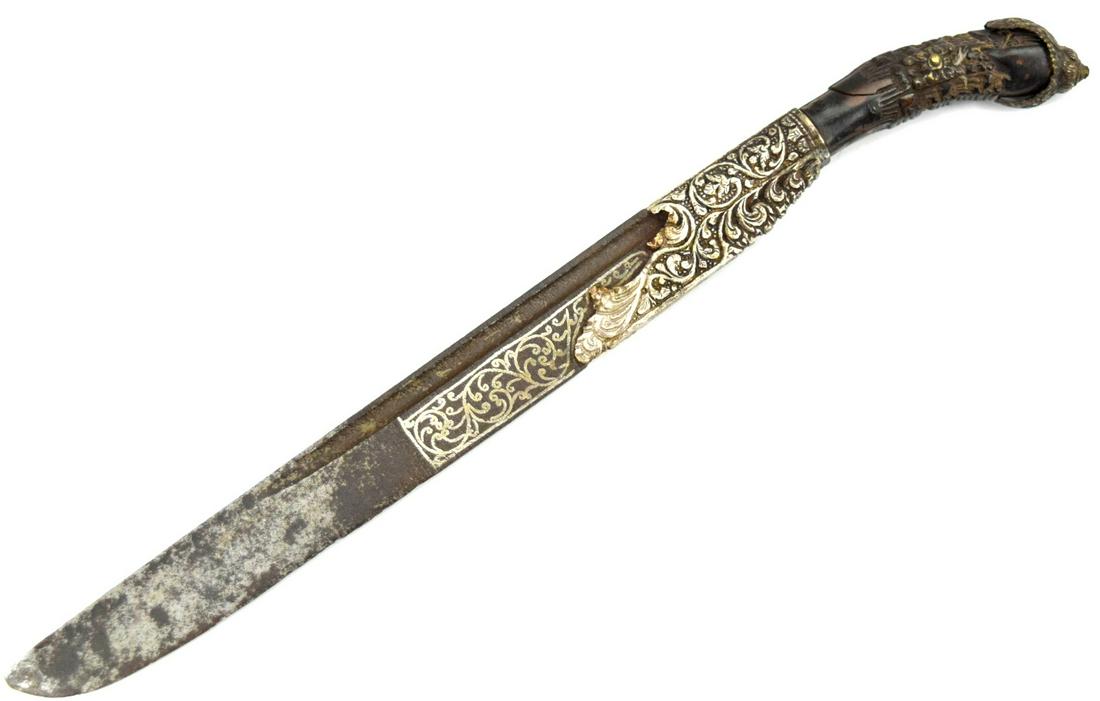 19th C. Piha Kaetta Ceylon Silver Decorated Dagger: 19th C. Piha Kaetta . Of traditional form steel blade with cast Silver decorated panels. Carved horn handle Total length: 9 1/2", Blade length : 7 1/4". ~ . Detailed condition reports are not included