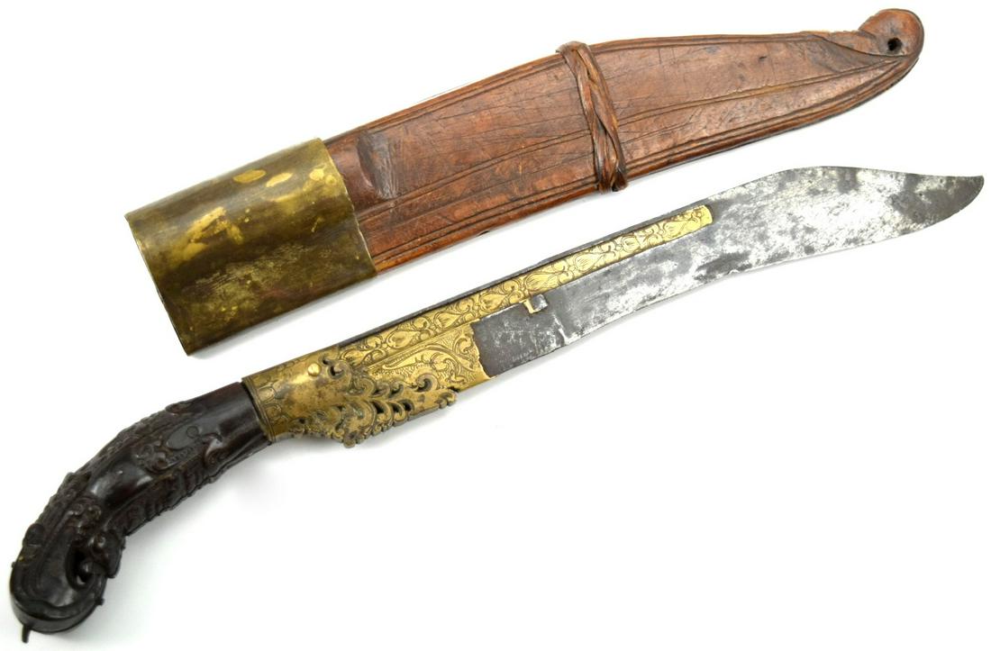 CHECK Large 19th C. Copper mounted Piha-kaetta Sri Lanka Dagger: Large 19th C. Copper mounted Piha-kaetta Sri Lanka Dagger. Of traditional form with single edged steel blade with drop point and fuller along the back edge. Original wooden and copper mounted scabbard