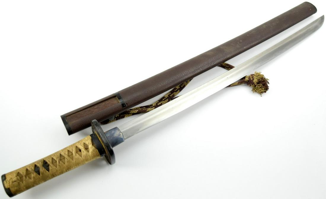 Japanese Samurai Wakizashi Sword - Edo period Blade- Nice mounts: Japanese Samurai Wakizashi Sword in Nice mounts. Edo period blade. Total length (inside scabbard if present) : 25 3/8", Blade length : 17 1/2". ~ . Detailed condition reports are not included in this 