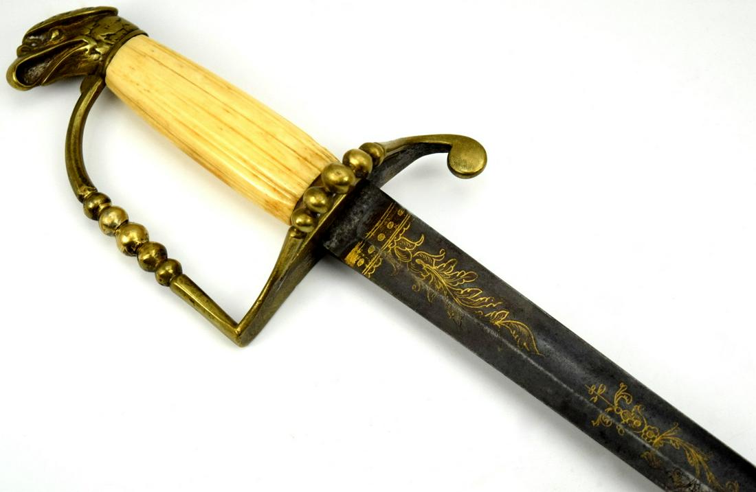 1840s US Eagle Head Infantry Officer Sword: 1840s US Eagle Head Infantry Officer Sword. Edged bued and gold inlaying blade bearing flower motifs. Brass guard and eagle pommel. Total length (inside scabbard if present) : 237 3/8 ", Blade length