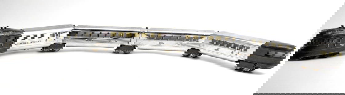 Lionel #616 Flying Yankee Streamliner Set: Lionel #616 Flying Yankee streamliner train with pair #617 coach and#618 rear coach. O gauge. Untested.~~. Detailed condition reports are not included in this catalog. For additional information, incl