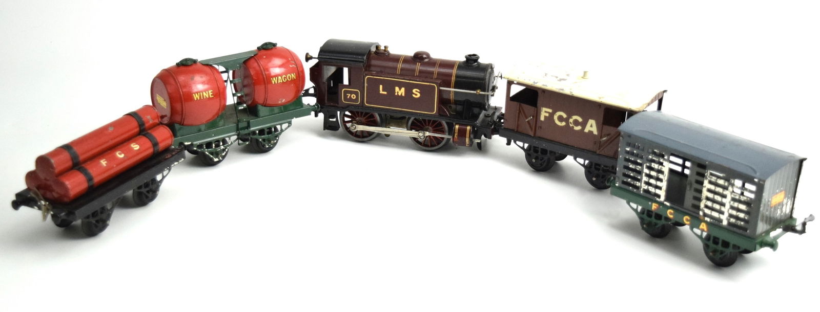 Vintage Hornby Special LMS 70 Tank Locomotive Train Set: Fine vintage Hornby Export ( Argentine ) O gauge toy train set. LMS 70 Locomotive, 4-wheel Wine Wagon, Milk Traffic Van with green base, FCCA Brake Van and FCS tank car with black base.~~. Detailed co