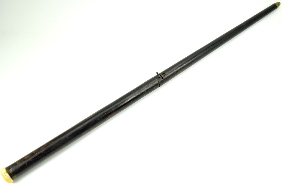 Rare Antique Air Gun Walking Cane with Round top: Rare Antique Air Gun Walking Cane with Round top. Probably English, 19th C. Total length: 35 3/4".~~. Detailed condition reports are not included in this catalog. For additional information, including