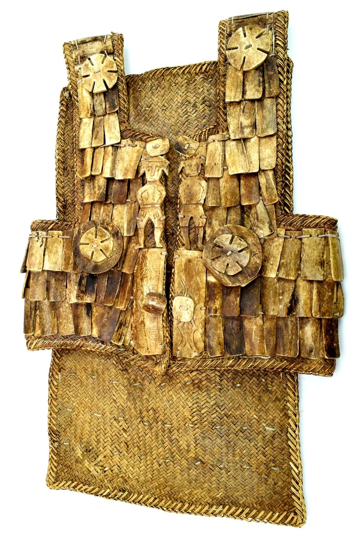RARE EARLY 20TH C. INDONESIAN SULAWESI TORAJA ARMOR VEST: A rare form of an Indonesian armor from the Toraja people, this kind of armor is made of materials found in nature. Older examples consist of fish scales and tree bark such as those found in the Pitt 