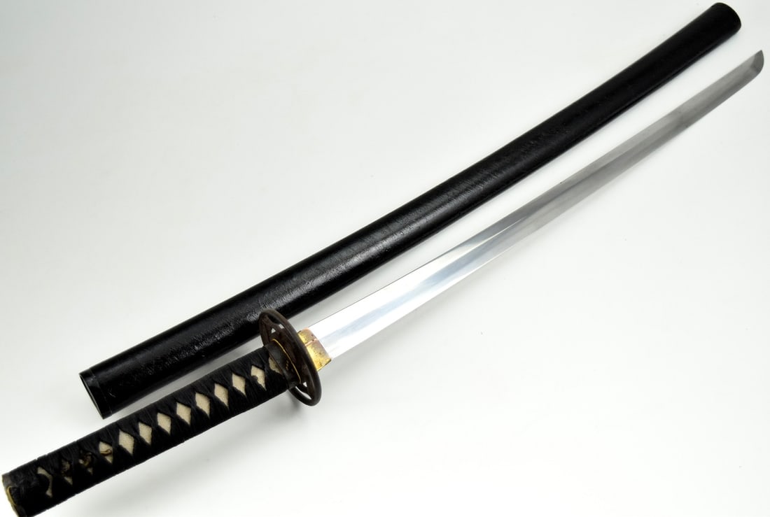 Good Japanese Wakizashi Sword ~ Nice Fittings: Good Japanese Wakizashi Sword. Very old ( Shinshinto period) almost straight blade, gilt and brass pommel and handle collar fittings. Nice tsuba. Total length inside scabbard : 36", Blade length : 21 