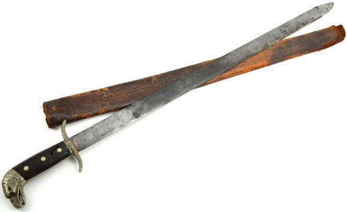 LONG ANTIQUE MEXICAN EAGLE HEAD MACHETE SWORD: Antique Mexican Eagle Head Machete Sword. Straight, long blade bears Collins & Co maker marked. Horn handle, Guard and eagle head shaped pommel. decorated leather scabbard with some loses. Total lengt