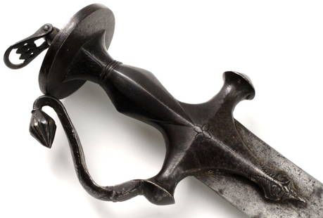 Rare 18th-19th C. Mughal Indian Sultan Bodyguard's Tulwar Sword with a Massive Blued Iron Hilt and: Rare 18th-19th C. Mughal Indian Sultan Bodyguard's Tulwar Sword with a Massive Blued Iron Hilt and Wide Beefy Blade with Broadened Tip Area, a Highly Unusual and Fascinating Weapon. Total length: 25 7