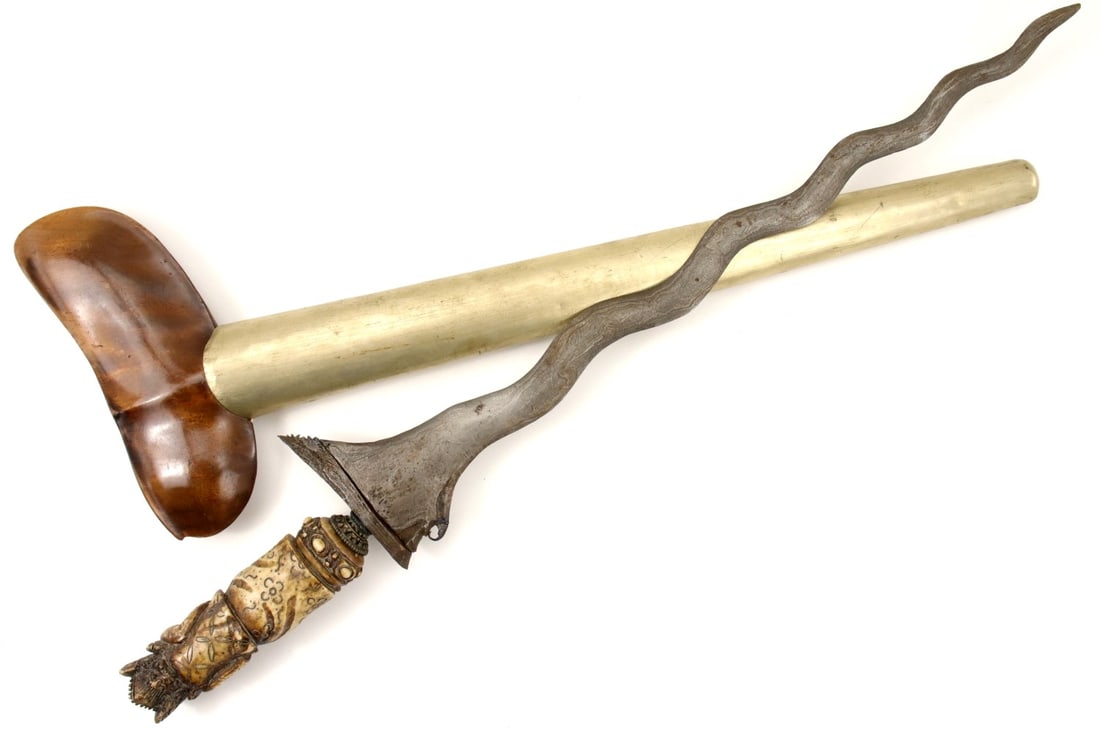GOOD ANTIQUE INDONESIAN KERIS DAGGER WITH FINE CARVED BONE GRIP & DAMASCUS STEEL BLADE: Good Antique Indonesian KERIS Dagger with Fine Carved Bone Grip & Damascus Steel Blade. Total length (inside scabbard if present) : 19 3/4", Blade length : 14 1/4". ~~. Detailed condition reports are 