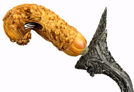 Fine Indonesian Madura, Java KERIS Dagger ~ Very Fine Carved Grip & Damascus Blade ~ Early 20th C.: Keris from Madura have some of the most distinctly carved hilts of all Indonesian keris. The hilts often resemble the Javanese form in rough outline but are otherwise fantastically carved with