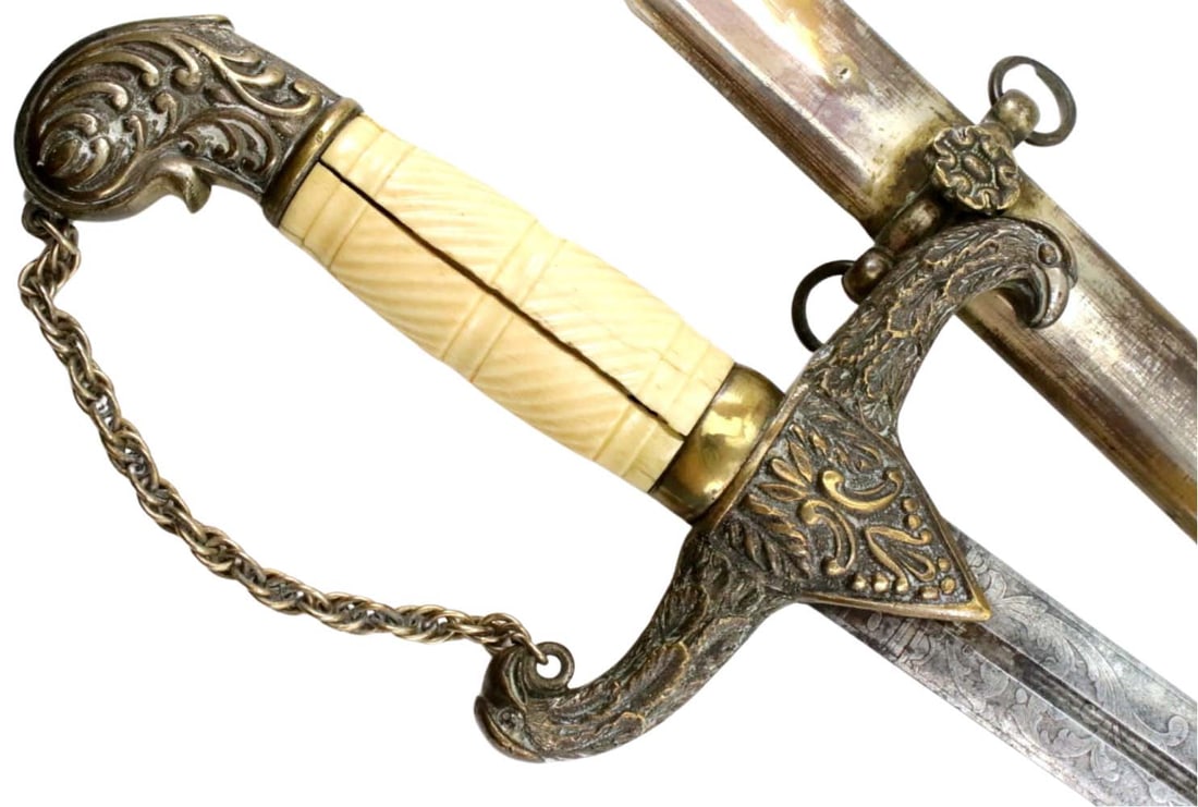 Scarce Pre American Civil War Militia Officer's Sword With Fine Engraved Blade. Nice Silvered Mounts: Scarce Pre American Civil War Militia Officer's Sword With Fine Engraved Blade. Nice Silvered Mounts With Eagle Head Finials. Carved Cattle Bone Grip, Has One Split But Solid Overall. Blade With Fine 