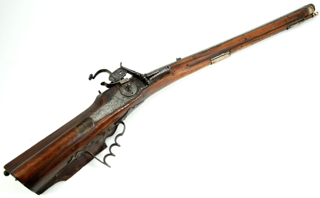 GOOD 16TH-17TH C. GERMAN OR AUSTRIAN MILITARY OR HUNTING WHEELLOCK RIFLE: Good 16th-17th C. German or Austrian Military or Hunting Wheellock Rifle. Total length: 36 7/8". ~~ . Detailed condition reports are not included in this catalog. For additional information, including