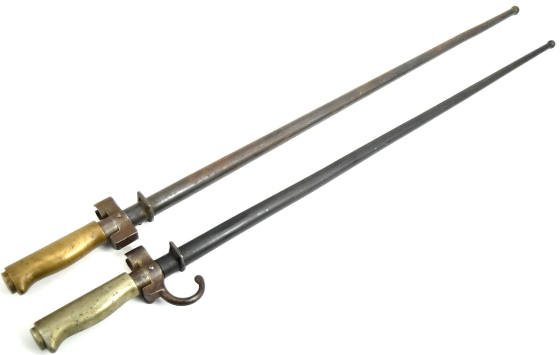 TWO FRENCH 1874 LABEL BAYONETS WITH SCABBARDS: Two French 1874 Label Bayonets with Scabbards. Approximate length of each (inside scabbard if present) : 25 3/4", Blade length : 20 3/8". ~~ . Detailed condition reports are not included in this catal