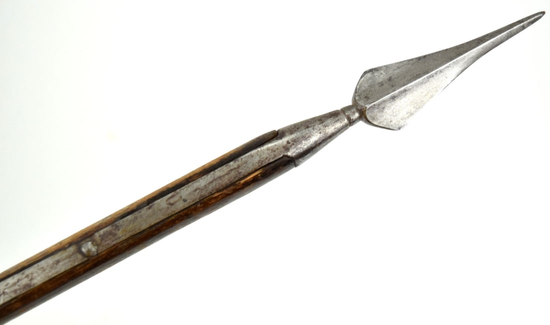 SCARCE 14TH-16TH C. ITALIAN POLEARM SPEAR: Scarce 14th-16th C. Italian Polearm Spear. Very Old Full Length Haft. Total length 49 1/8", Blade length : 4 1/4". ~~. Additional images are available at sofedesignauctions.com. ~~. Detailed condition