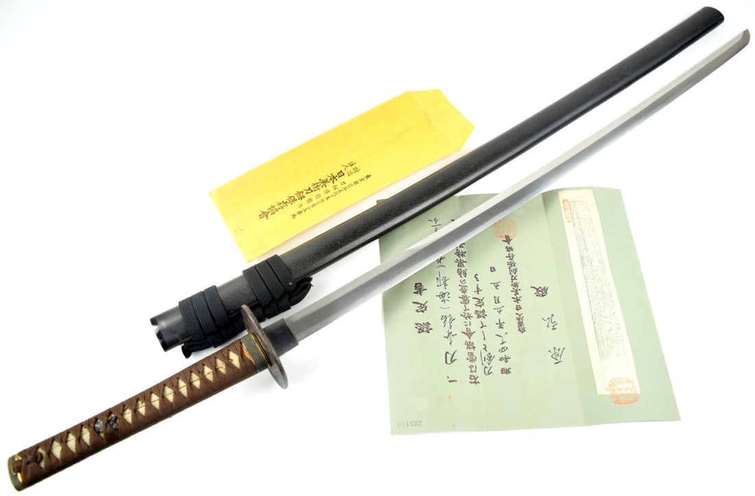 1400s-1500s Japanese Koto Katana Sword with NBTHK Kanteisho Certification ~ 27 inches blade: Koto katana, 27 and 1/2 inch length of cutting edge, unsigned ca. 1400?s-1500?s, with NBTHK kanteisho certification attributing the blade to Kaifu school, the blade shows a rare kanmuri-otoshi zukuri 