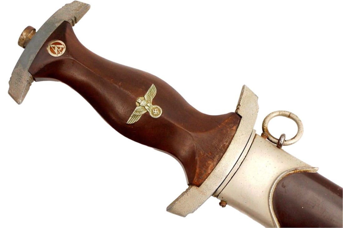 Very Good WW II German SA Dirk Dagger Marked ''RZM M7/85''.: Very Good WW II German SA Dirk Dagger Marked ''RZM M7/85''. Total length (inside scabbard if present) : 15", Blade length : 8 3/4". ~ . Detailed condition reports are not included in this catalog. For