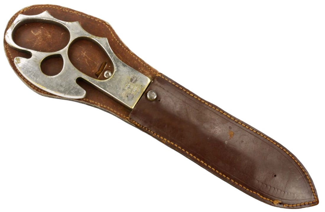 Scarce 1950 English Breast Knuckle Knuckleduster Fighting Knife of Indian PRINCESS JODHPUR Wedding: Scarce 1950 English Breast Knuckle Knuckleduster Fighting Knife of Indian PRINCESS JODHPUR Wedding Bodyguard. In Its Original leather Sheath, Very Well Marked. Total length (inside scabbard if present