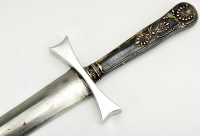 ENGLISH OR AMERICAN SILVER GRIPPED DIRK DAGGER WITH A STRONG BROAD BLADE.