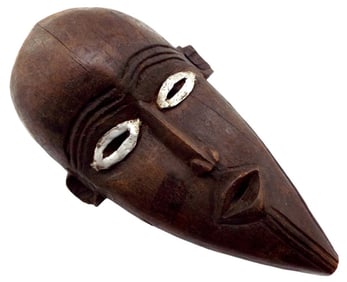 VINTAGE OR ANTIQUE AFRICAN TRIBAL DARK WOOD FACE MASK WITH WHITE METAL EYES.