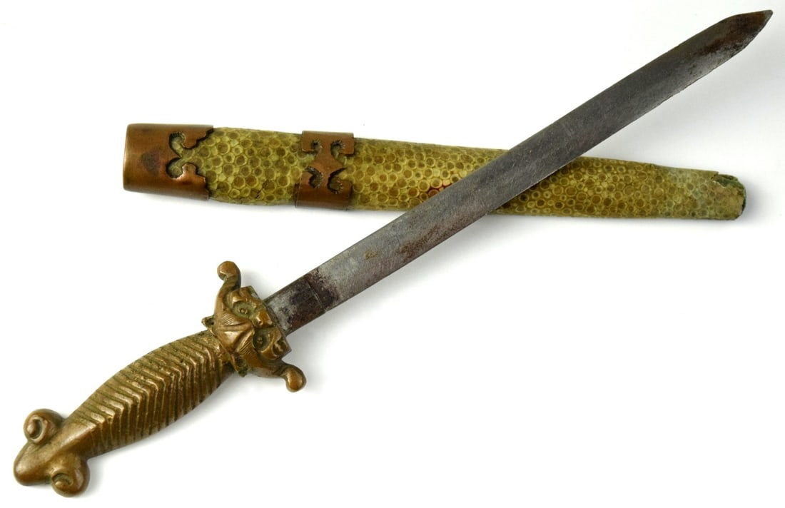Early 20th Century Miniature chinese juan sword: Early 20th Century Miniature Chinese Juan Sword. Marked "china" on the back which corresponds to early 20th century period, brass mounts, scabbard end piece is missing. Total length: 7 1/8", Blade len