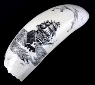 Vintage scrimshaw on whale tooth by Jones. Nicely done cutting in depiction of sailing ship on the