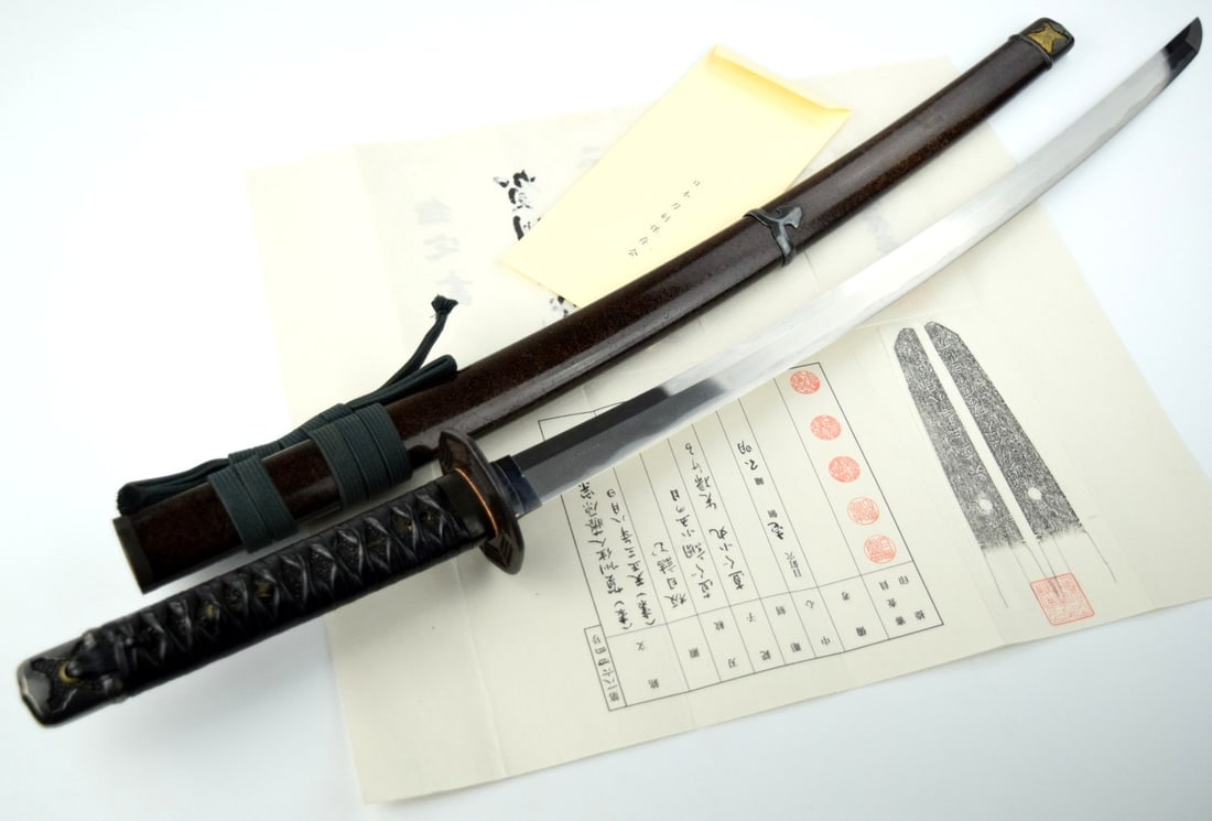 Excellent Koto Chisa Katana ~ signed Kashu Ju Nin Fujiwara Munemitsu and dated ~ NTHK certificate: Koto chisa katana, 23 and 1/2 inch length of cutting edge, exceptional condition blade and mounts. A rare signed and dated Koto with the blade signed Kashu Ju Nin Fujiwara Munemitsu and dated Tensho S