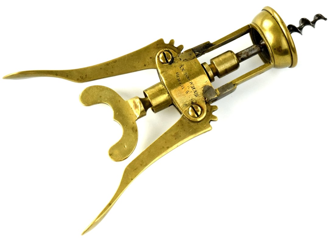 Antique Solid Brass Wine Corkscrew Bottle Opener: Antique solid brass wine corkscrew bottle opener by S.Wood, Syracuse NY company. Marked. Size: 7 3/45". Detailed condition reports are not included in this catalog. For additional information, includi