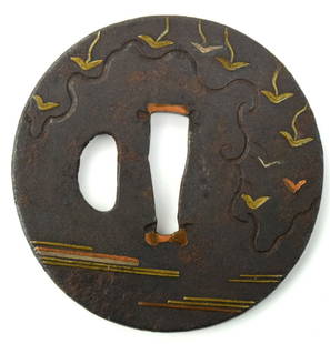 Edo period iron tsuba with carving and multi-metal inlay copper, silver, gold.: Edo period iron tsuba with carving and multi-metal inlay copper, silver, gold. Size: 2 7/8". Detailed condition reports are not included in this catalog. For additional information, including conditio