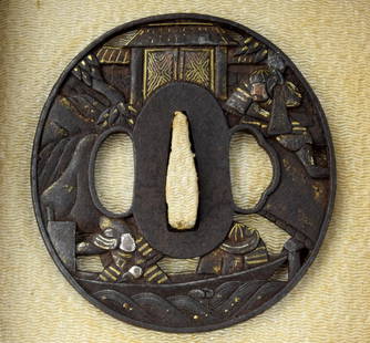 Soten school open work iron Tsuba, Hikone Bori gold inlay with castle moat boat attack scene. Edo: Soten school open work iron Tsuba, Hikone Bori gold inlay with castle moat boat attack scene. Edo Period. Size: 2 7/8" x 2 11/16". Detailed condition reports are not included in this catalog. For addi
