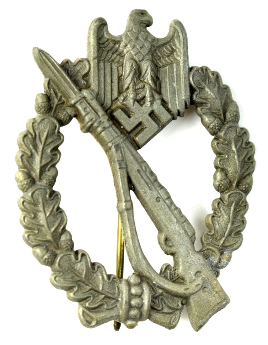 German WWII Infantry Assault Badge in Silver: German WWII Infantry Assault Badge in Silver. Size: 2 3/8" x 1 7/8". Provenance - from collection of US Army Eldon Foster, Denver Colorado Detailed condition reports are not included in this catalog. 