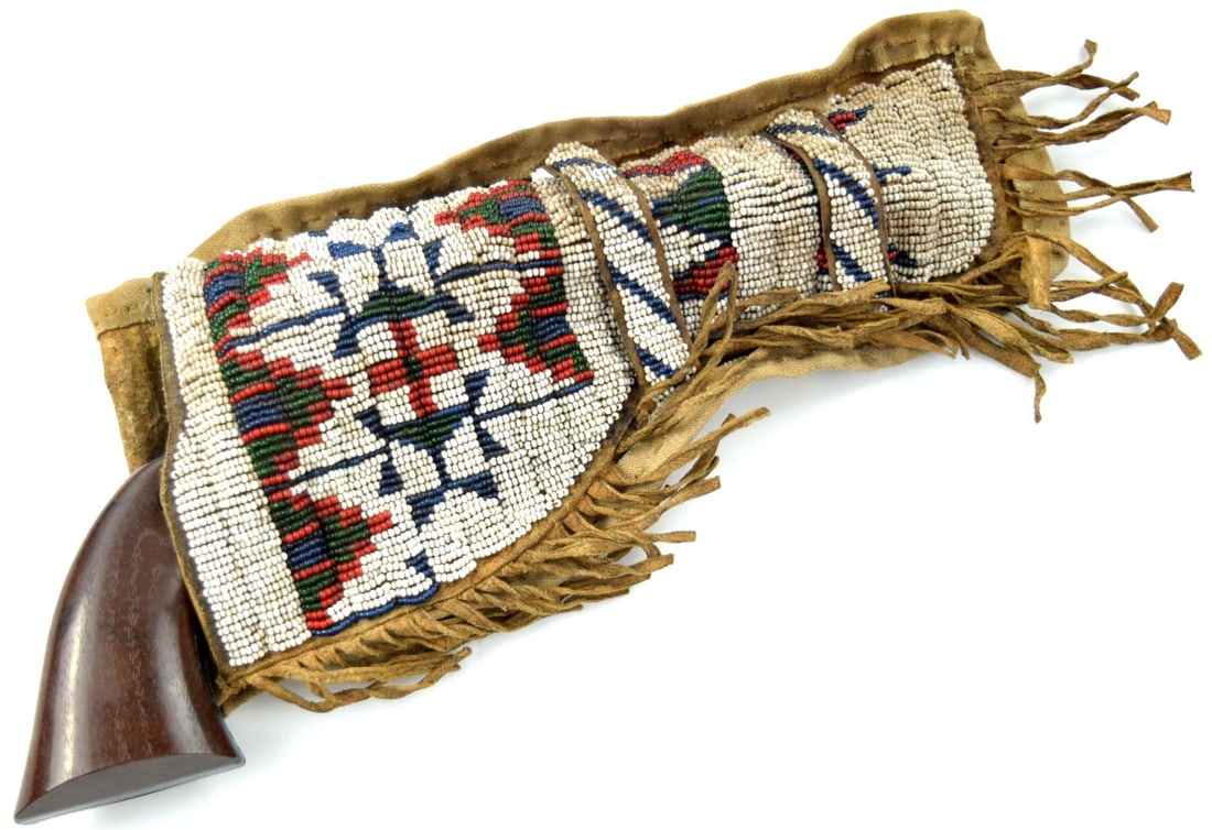 Collectible Vintage DAISY Toy Revolver Pistol in Very Nice Antique American Indian Beaded Buffalo: Collectible Vintage DAISY Toy Revolver Pistol in Very Nice Antique American Indian Beaded Buffalo Hide Holster. Total Gun Length: 11 1/2". Detailed condition reports are not included in this catalog.