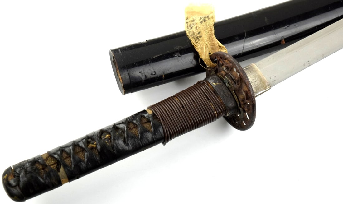 Edo period Japanese Katana, ca. 1600s - 1800s, Samurai style koshirae, WW2-era surrender tag: DEAR BIDDERS, TO VIEW MORE DETAILED CLOSE-UP IMAGES OF THE ITEM INCLUDING PHOTOS OF THE TANG AND SIGNATURES, PLEASE VISIT OUR SITE : Sofedesignauctions.com AND FIND THIS LOT IN THE CURRENT CATALOG. TH