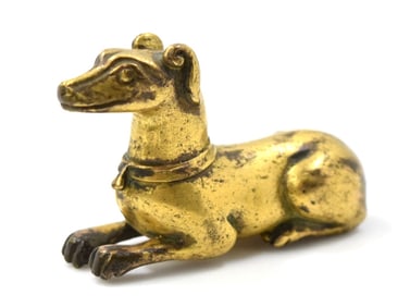 A rare Chinese Gilt Bronze Paperweight In The Shape Of A Dog Han Dynasty Period