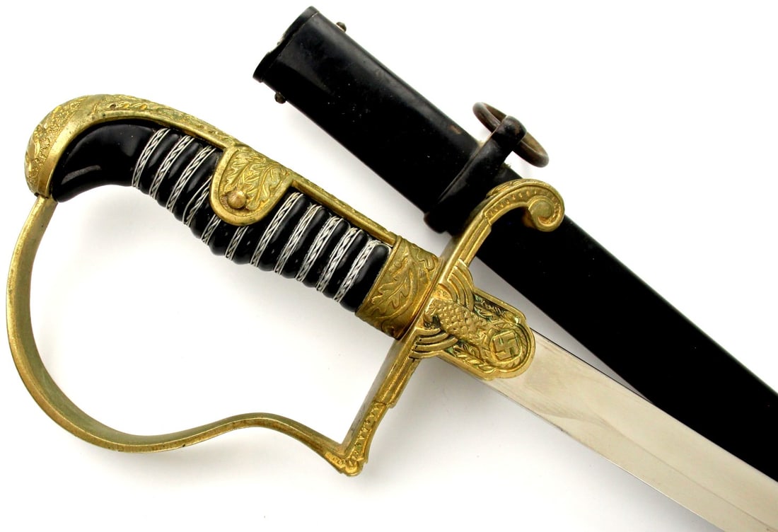 Fine German WW II Officer's Sword in Gold Gilt Mounts with Dove-head Head Pommel. Carl Eickhorn: Fine German WW II Officer's Sword in Gold Gilt Mounts with Dove-head Head Pommel. Carl Eickhorn Maker Marked. Total length (inside scabbard if present) : 40 3/4", Blade length : 35". ~ . Detailed cond