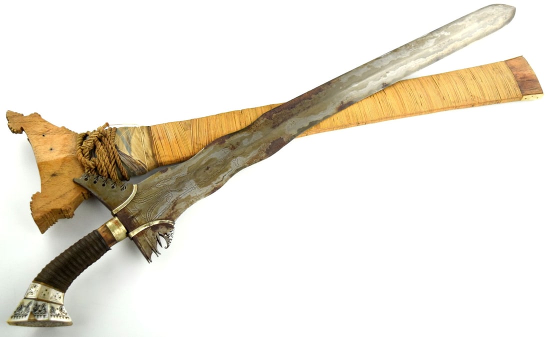 Very Good Early 20th C. Philippine Moro Datus Moro KRIS Sword ~ Sulu, Maguidanao ~ Damascus Blade ~: This is a classic sword of the Moro people of the southern Philippines and of the Sulu Sea area called a kris. The classic Moro kris is based heavily on the Indonesian keris but is distinctly larger a