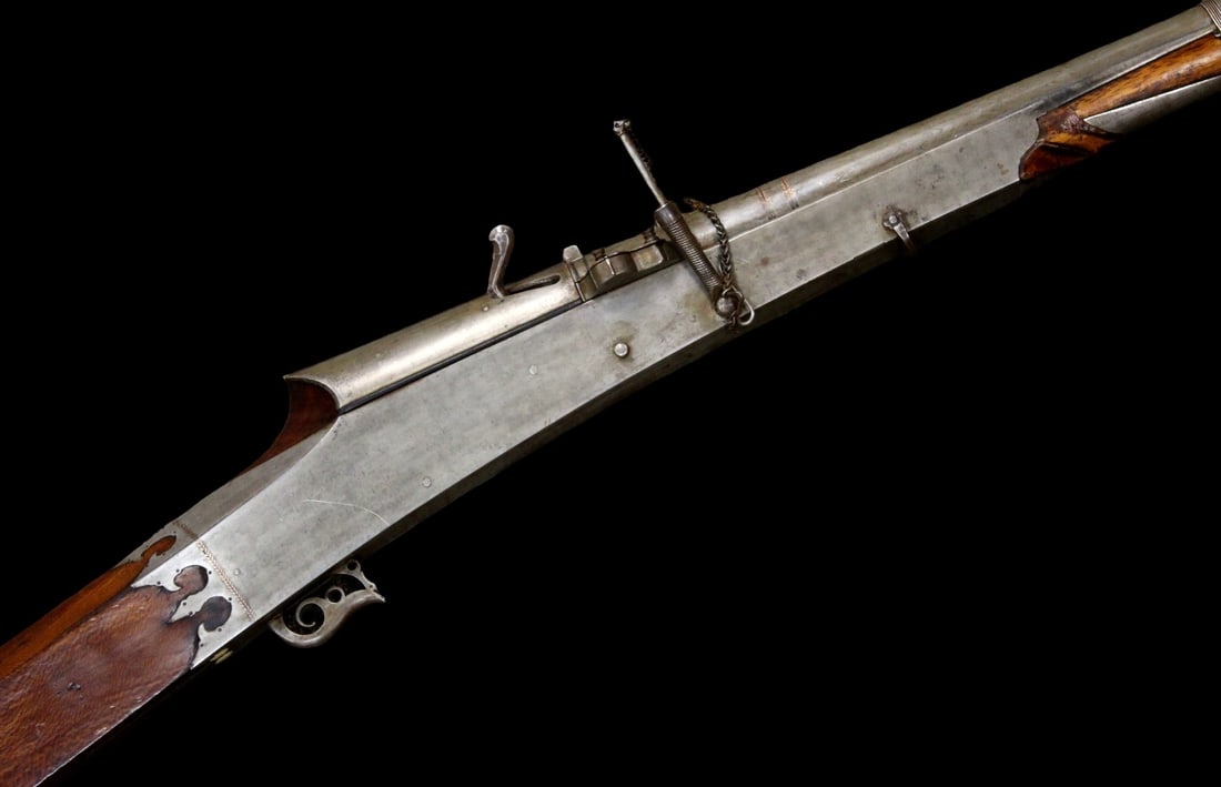 19th C. Mughal/Indian Toradar (Tordar) Matchlock Musket â?? watered-Steel, Chained Lock: 19th century Mughal/Indian toradar matchlock musket, built around a heavy, squared â??toradarâ?? breech with traditional matchlock mechanism. The steel lock area shows attractive watered / pattern-w