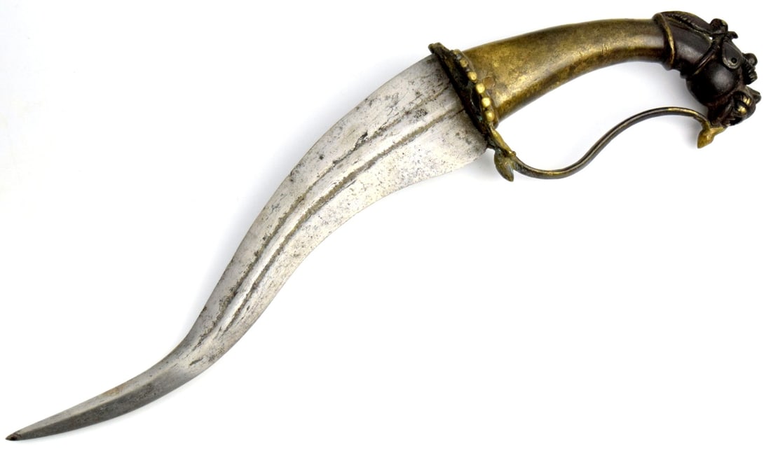 18th-19th c South Indian Brass Yali Hilted Dagger: South India, Deccan, Bijapur, or Golconda regions. A combination of Persian and Indian symbols of power zoomorphic hilts embody the power of the dragon and were often depicted in portraits of Sultans.