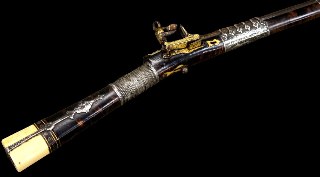 Very Fine 18th C. Long Caucasian Flintlock (Miquelet) Rifle with Gold-Inlaid Lock: Very Fine 18th C. Long Russian Caucasian Rifle, featuring a highly decorative flintlock (miquelet-style) action with extensive gold and silver inlay/koftgari-style foliate decoration throughout the lo